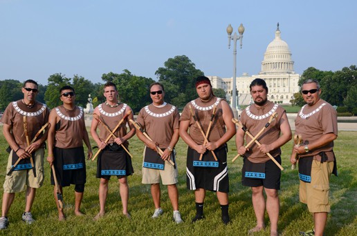 Gary Batton and others pose for a team picture in their stickball uniforms