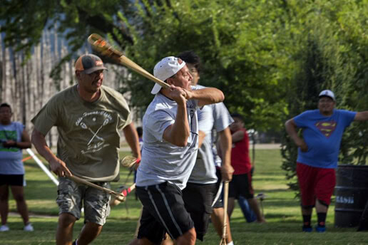 Gary Batton plays stickball