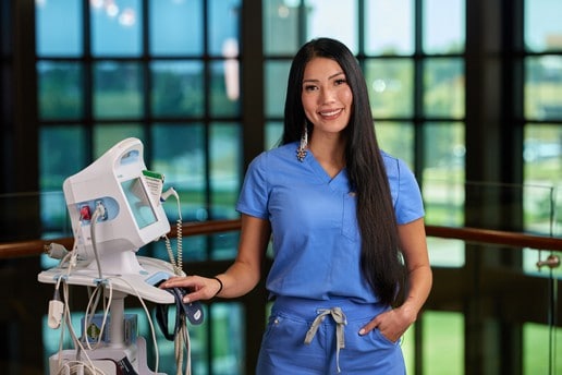 Tara Thorpe poses with some medical equipment