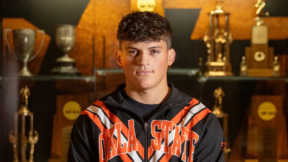 Profile view of Tagen Jamison wearing his OSU Jacket.