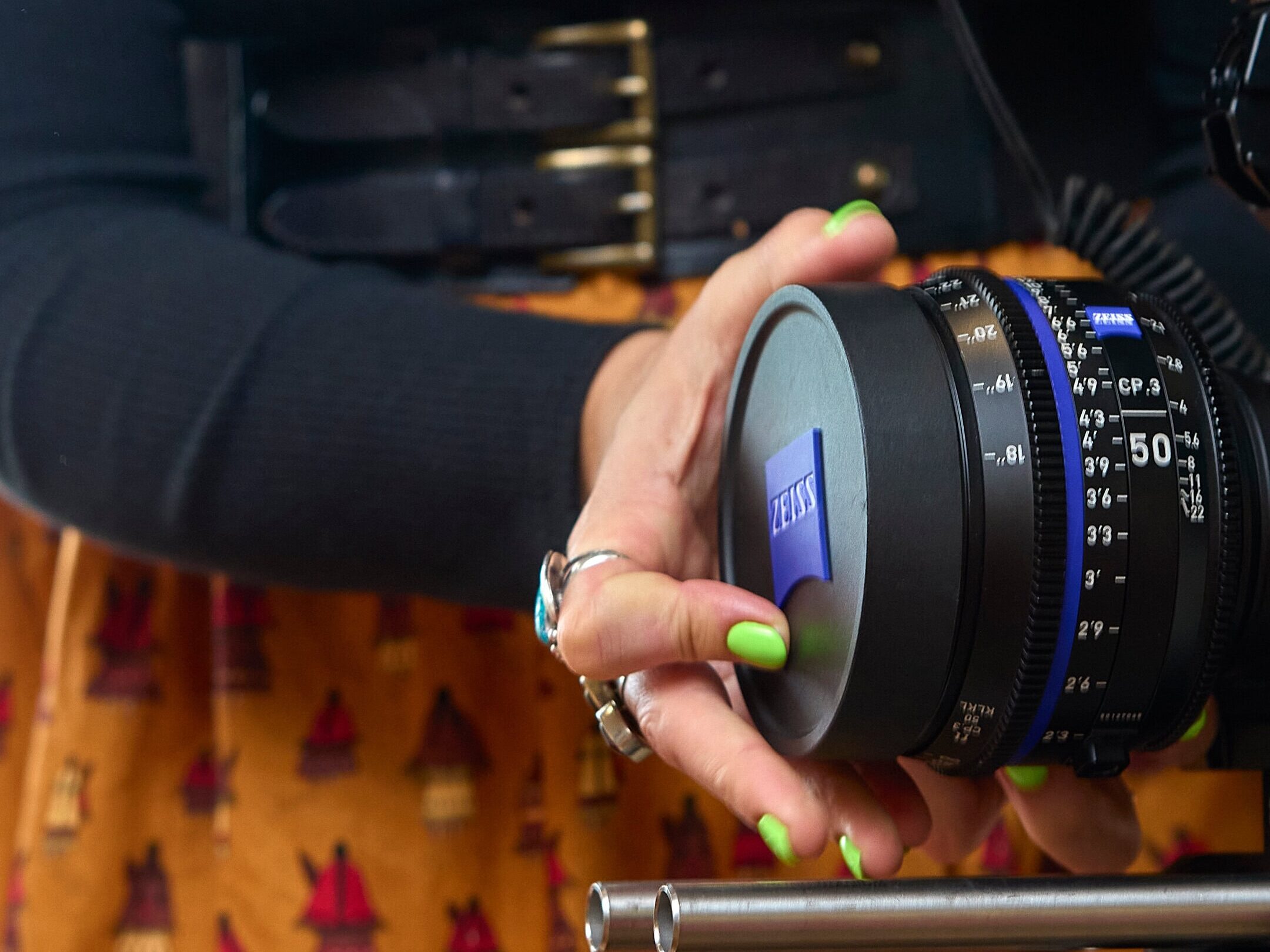 Colleen Thurston adjusting her camera lens.
