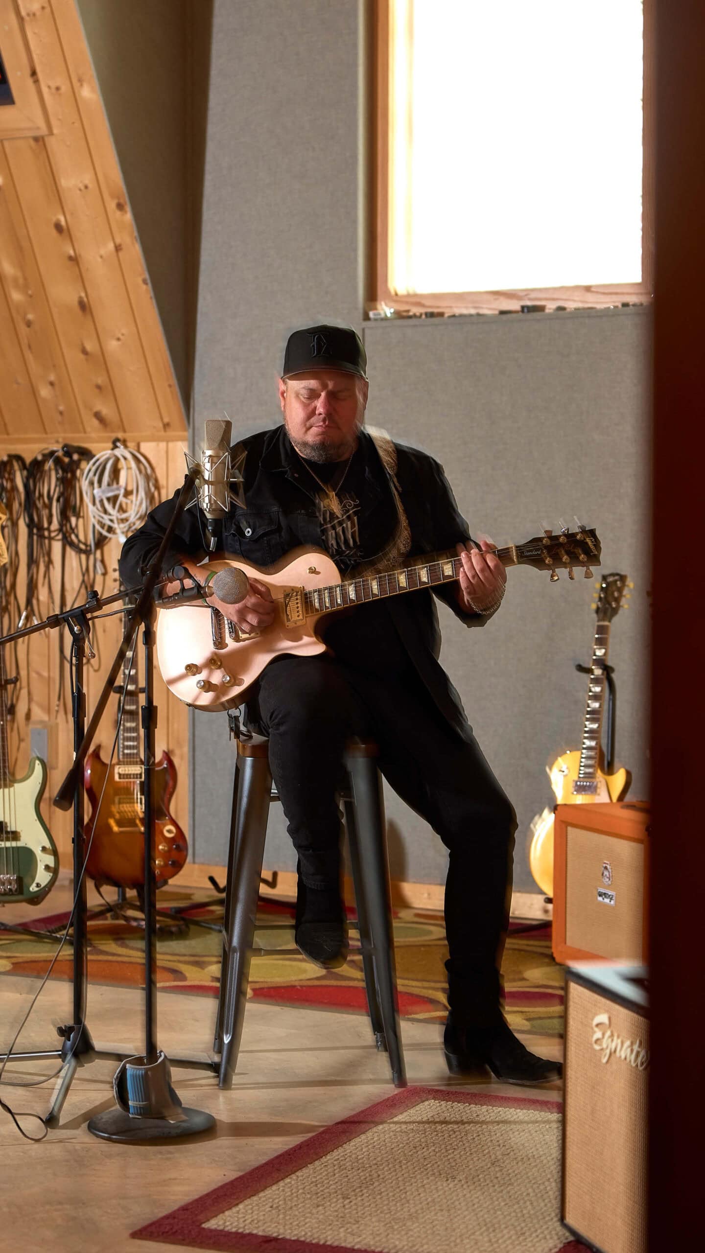 Joey Green playing his guitar.